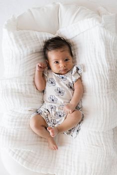 Experience ultimate comfort and style with our Bamboo Romper in Desert Bloom! Made from soft and sustainable bamboo, it features a sweet floral print on a white background. With convenient snaps for easy diaper changes, this romper is perfect for your little one from 0-18 months. Shop now for your stylish baby girl! Fabric: 95% Viscose From Bamboo 5% Spandex Care: Wash inside out in cold water with like colors Do NOT Bleach Tumble dry low heat Playsuits Outfit, Stylish Baby Girls, Baby Luna, Desert Bloom, Baby Bamboo, Diaper Bag Accessories, French Baby, Baby Co, Spring Baby