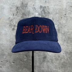 Bear Down Embroidered Hat. 100% cotton corduroy Soft, unstructured crown with a cotton twill sweatband and taping. Adjustable buckle. This product is made especially for you as soon as you place an order, which is why it takes us a bit longer to deliver it to you. Making products on demand instead of in bulk helps reduce overproduction, so thank you for making thoughtful purchasing decisions! Adjustable Cotton Trucker Hat With Embroidered Logo, Adjustable Corduroy Trucker Hat With Flat Brim, Winter Cotton Snapback Hat With Flat Brim, Adjustable Corduroy Snapback Hat With Curved Brim, Winter Snapback Baseball Cap With Embroidered Logo, Vintage Cotton Baseball Cap For Winter, Adjustable Cotton Snapback Hat With Embroidered Logo, Adjustable Cotton Hats For Winter, Adjustable Flat Brim Dad Hat With Embroidered Logo