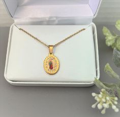 "Dainty & Beautiful Our Lady of Guadalupe Necklace  ♦  3/4\" Lady Guadalupe gold plate pendant accented w/ rhinestones ♦  16\" or 18\" Gold plated Chain with clasp ♦  Comes Gift Boxed FLAT RATE SHIP - add another item at NO additional cost Find other great items at  https://www.etsy.com/shop/MyLadyTreasures" Oval Our Lady Of Guadalupe Necklace For Gift, Oval Our Lady Of Guadalupe Necklace Gift, Oval Our Lady Of Guadalupe Jewelry Gift, Lady Of Guadalupe Necklace, Guadalupe Necklace, Lady Guadalupe, Our Lady Of Guadalupe, Lady Of Guadalupe, Catholic Gifts