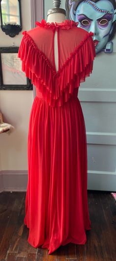 V-neck Ruffled Gown For Prom, Vintage V-neck Dress With Ruffles, V-neck Gown With Ruffles For Evening, Evening Dresses With Ruffles And Empire Waist, Empire Waist Ruffle Evening Dress, Evening Gown With Ruffles And V-neck, Flowy Evening Dress With Ruffled Straps, V-neck Gown With Ruffles For Gala, Red V-neck Dress With Pleated Bodice