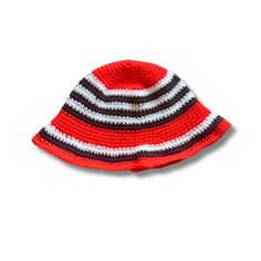 Made to order crochet bucket hat in red with white and black stripes. Perfect for gifting or vacations! Bucket hat coloring pattern is inspired by Nigerian artist Odumodublvck. One size, unisex adult hat sizing measuring approximately 23 inches in circumference. Red Hand-knitted Crochet Hat For Beach, Red Yarn Hat With Curved Brim, Red Beanie Crochet Hat For Beach, Red Crochet Beanie For Beach, Red Adjustable Crochet Bucket Hat, Casual Red Crochet Bucket Hat, Handmade Red Crochet Bucket Hat, Casual Red Handmade Crochet Hat, Red Handmade Adjustable Bucket Hat