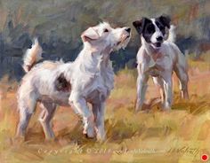 two white dogs standing next to each other on a field