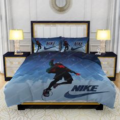 a bed room with a neatly made bed and two night lights on the nightstands