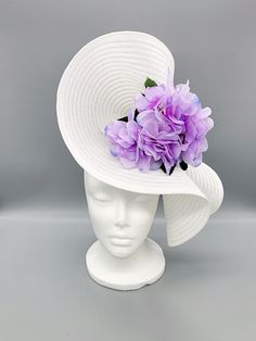 A gorgeous white fascinator with a purple hydrangea flower accent. Attached to a thin headband for ease of use.  This stunning handmade hat would be perfect for horse races, weddings, church, christening, tea parties, cocktail parties, birthdays, bridal showers, engagement parties, bachelorette parties, baby showers, Mother's Day or just because you're ready to slay. If you're interested in having Rose + Ivy design a custom hat for your occasion, please send us a message and include your desired White Fascinator, Wedding Tea Party, Horse Races, Royal Ascot Hats, Purple Hydrangea, Derby Hats Fascinators, Bridal Fascinator, Hat Fascinator, Bridal Hat