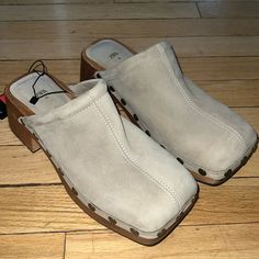 These Are Zara Beige Suede Square Toe Wooden Heel Clogs Size 39 Brand New With Tags Minor Scuffs From Trying On In Store But Absolutely Unworn With Tags Attached. Need To Make Room For New Stuff Bought These On A Whim. Casual Suede Mules With Block Heel, Casual Suede Clogs With Block Heel, Casual Mules With Wooden Heel, Beige Suede Casual Clogs, Casual Beige Suede Clogs, Spring Beige Suede Clogs, Casual Beige Platform Mules, Spring Suede Clogs With Block Heel, Casual Suede Clogs With Wooden Heel