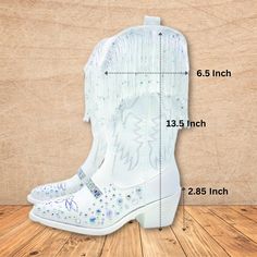 An amazing and original choice to make a statement for parties, daily, weddings, country side music festivals, line dancing, western theme parties, rodeo, or shopping these Customized 2.5-inch heels and classic western embroidery cowboy boots for women's design show elegant Western style. Soft synthetic leather lining wicks away moisture and offers a comfortable next-to-skin feel and cushioning to give feet comfort. Mid-calf cowgirl boots for women are designed with western embroidery, side zipp Western White Embellished Boots, Embellished Festival Boots With Round Toe, Festival Embellished Boots With Round Toe, White Embellished Snip Toe Boots, White Western Party Boots, Rhinestone Boots With Round Toe For Rodeo, Western Boots With Rhinestone Fringe And Round Toe, White Snip Toe Party Boots, Western Boots With Bling And Round Toe