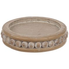 a round wooden tray with beads on the rim and bottom, isolated against a white background