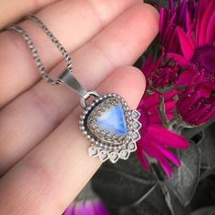 A pendant made of Sterling Silver and a faceted Moonstone cabochon with a bright blue flash.  The size of this stone is 10mm. The necklace you see in the pictures is not included. - Handmade - Sterling Silver - Rainbow moonstone - The pendant measures 3cm x 1,9cm More pendants: https://www.etsy.com/shop/IngeJewels?ref=hdr_shop_menu&section_id=13717641 Please read my policies before buying. Silver Moonstone Pendant Gemstones, Faceted Moonstone Pendant Necklace, Moonstone Pendant Necklace With Oxidized Finish, Spiritual Moonstone Nickel-free Necklace, Rainbow Moonstone Pendant, Moonstone Pendant, Bright Blue, Oxidized Sterling Silver, Handmade Sterling Silver