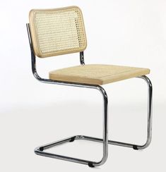 a white chair with a metal frame and woven seat pad on the back, against a white background