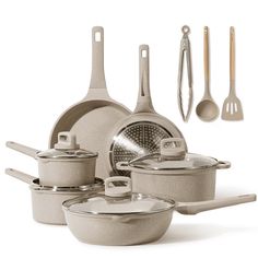 an assortment of pots and pans with utensils