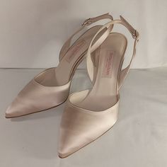 Ferracuti 4.2 Inch Satin Close Toe Heel With Buckle In Light Tan! Be The 1st And Only To Have These In The Us Elegant Closed Toe Slingback Pumps With 4-inch Heel, Close Toe Heel, Elegant Cream Slingback Pumps With 4-inch Heel, Elegant Almond Toe Slingback Pumps, Feminine Ankle Strap Wedding Shoes For Formal Occasions, Elegant Slingback Pumps With Heel Strap And Closed Toe, Elegant Closed Toe Slingback Pumps With Heel Strap, Chic Fitted Slingback Pumps For Wedding, Classic Slingback Pumps With Almond Toe For Party