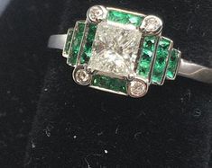 Green Diamond Art Deco Rings, Art Deco Green Jewelry With Brilliant Cut, Luxury Formal Emerald Ring With Channel Set, Luxury Channel Set Emerald Ring For Formal Occasions, Luxury Green Channel Set Rings, Art Deco Emerald Ring With Brilliant Cut, Luxury Emerald Rings Channel Set, Luxury Emerald Rings With Channel Set, Luxury Channel Set Emerald Ring For Anniversary