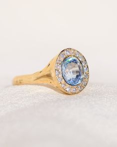 *One of a Kind* hand-carved 14k Yellow Gold ring, set with a stunning oval Sri Lankan Lavender Sapphire, surrounded by a halo of White Diamonds. Center Sapphire is approx. 7 x 6mm and 1.65 ct. 💌 Please write desired size (between 4-8) in *Notes* section at checkout. * Lavender Sapphire from Sri Lanka, is a stone of deep awakening, stimulating the rise of the kundalini transformation energy, while opening your connection with your spirituality. Opening the third eye and crown chakras, it imparts Luxury Lab-created Sapphire Halo Ring, Luxury Lab-created Sapphire Halo Jewelry, Oval Yellow Gold Sapphire Ring With Halo Design, Oval Sapphire Ring With Halo Design In Yellow Gold, Luxury Oval Cluster Ring With Halo Design, Luxury Oval Cluster Ring With Halo Setting, Oval Sapphire Ring With Halo, Oval Sapphire Halo Ring With Center Stone, Oval Cluster Ring With Bezel Setting