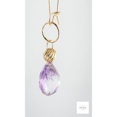 These Amethyst and Gold Drop Earrings are a stunning addition to any jewelry collection. These drop earrings are so pretty. The transparent faceted amethyst teardrops have beautiful purple, white, and pale-yellow hues that sparkle in the light. The stones are teardrop shaped. They add elegance and originality to your look! Unbelievably beautiful, faceted, teardrop-shaped amethyst stones. The earrings are finished with high quality 14K gold-filled ear wires that have a secure closure Fancy 14K go Purple Gemstones, Yellow Hues, Long Gold Earrings, Amethyst Stones, Artisan Rings, Fancy Beads, Boho Chic Jewelry, Gemstone Jewelry Handmade, Unique Beauty