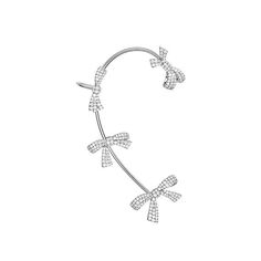 Make a chic statement with our Diamond Bow Ear Cuff. This dainty piece is plated in 14k white gold for a touch of elegance. Perfect for adding a pop of pink or clear sparkle to any outfit. Sold individually for ultimate versatility. Elegant Metal Ear Cuff For Party, Adjustable Silver Ear Cuff Trendy Style, Adjustable Silver Trendy Ear Cuff, Formal Silver Diamond Ear Cuff, Silver Cubic Zirconia Ear Cuff For Party, Silver Sterling Silver Ear Cuff For Party, Adjustable Formal Ear Cuff, Adjustable Ear Cuff For Formal Occasions, Elegant Metal Ear Cuff