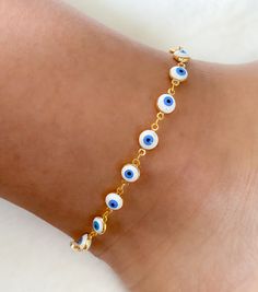 Evil eye anklet bracelet Beautiful and delicate anklets you can match with any outfit and wear everyday! MATERIAL AND SIZE 18k gold plated eye chain Enamel eyes Anklet length 23.5cm If you have questions about the product, feel free to reach me out. Don't forget to check out my other items in the store: Https://www.etsy.com/shop/nyahwithlove White Metal Anklet Perfect For Gifting, White Metal Anklet As Gift, White Metal Anklets For Gift, Trendy Evil Eye Jewelry For Festivals, Trendy Evil Eye Jewelry For Summer, Handmade Trendy Gold Anklets, Trendy Handmade Gold Anklets, Metal Evil Eye Bracelet For Gift, Evil Eye Metal Bracelet Gift