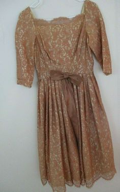 Handmade one of kind vintage Dress lace beige brown like color so pretty  satin layer lined with crinoline so sweet nice bow bust arm pit to pit inches 16 waist flat one way inches 12 shoulder to shoulder inches flat one way 18 sleeve 17 inches long  length inches 42  hips puff out with crinoline lining 38 plus pleated hard to measure mental zipper hooks and eyes really well made  I ship fast well packed and padded USPS or global shipping program smoke free pet free e1stg Retro Lace Vintage Dress For Vintage Fashion, Retro Lace Vintage Dress, Vintage Evening Dresses With Bow, Beige Vintage Dress For Evening, Vintage Wedding Dresses With Bow, Vintage Beige Dress For Vintage Events, Beige Vintage Dress For Vintage Events, Retro Beige Dresses For Vintage Events, 1950 Dress