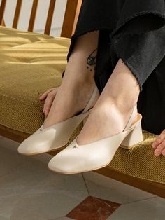 - Curved round toe- V upper line- Slingback strap- Non-slip outsoleMeasurements- Heel: 2.3- Size: KR225(US5.5)-KR250(US8)- This item is based on the KR shoe size. Please refer to the size chart.- This item runs true to size. For wide feet, please oder half size larger than your normal size.Composition & Care- Lambskin, Pigskin liningDesigner- Made in Korea- by Byeuuns- Style#: 300880755 Chic Medium Width Slip-on Slingback Pumps, Beige Slingback Sandals With Round Toe And Heel Strap, Summer Slingback Pumps With Reinforced Heel And Closed Toe, Beige Slingback Sandals With Padded Heel And Round Toe, Beige Round Toe Slingback Sandals With Padded Heel, Chic Beige Round Toe Slingback Sandals, Elegant Leather Sole Slingback Slip-on Sandals, Beige Slingback Sandals With Round Toe, Beige Closed Toe Slingback Pumps For Spring