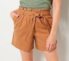 We've got your next dazzling summertime OOTD. These tie-waist shorts, a flowing tucked-in button-down, and your fresh white sneaks. I mean, the style is just sizzling. From Candace Cameron Bure. Cameron Bure, Candace Cameron, Candace Cameron Bure, Tie Waist Shorts, Short Pants, Beach Outfit, Fashion Pants, Paper Bag, Casual Shorts