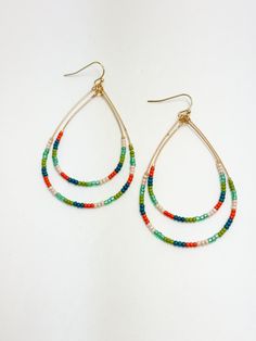 Teal & Orange Beaded Teardrop Earrings Green Teardrop Jewelry For Summer, Green Beaded Dangle Teardrop Earrings, Multicolor Dangle Teardrop Earrings For Summer, Beaded Teardrop Earrings For Summer, Bohemian Adjustable Teardrop Earrings With Colorful Beads, Summer Beaded Teardrop Earrings, Adjustable Bohemian Teardrop Earrings With Colorful Beads, Multicolor Teardrop Jewelry With Colorful Beads, Green Teardrop Earrings With Tiny Beads