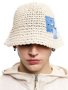 This is a casual and comfortable bucket cap made out of high quality cotton and paper blend fabric. With design detail of relaxed and deep silhouette, coarse structure for summer season, and rivet detail on the front, it gives a comfortable and trendy mood.- Deep and relaxed slihouette- Denim logo patch embroidery- Coarse texture for cool touch- Rivet detail on the front Casual Natural Brimmed Bucket Hat, Beige Cotton Bucket Hat With Short Brim, Natural Cotton Sun Hat With Short Brim, Casual Beige Cotton Hat, Natural Cotton Bucket Hat For Summer, Natural Cotton Brimmed Hat, Casual Cotton Bucket Hat In Natural Color, Natural Cotton Brimmed Sun Hat, Beige Cotton Bucket Hat For Beach