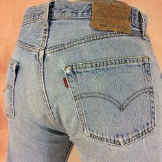 Size 33 Vintage 1990s Levi's 501 Distressed Ripped Light Wash Denim Jeans - Exposed Button Fly Jean, Made in USA, waist 33" large Brand: LEVIS 501 Size On Tag marked W34 L32 but fits more like 33" waist, 12.25" rise, 26.5 thighs, 46.5" hips, 30.5" inseam,16" leg opening! Fits a size 33, but check your measurements and compare the measurement with your garment. (see full measurement below) Recommended waist size: 33" (33x30.5) Material :  Cotton 100% Made In USA NOT YOUR SIZE? LOOK OTHER LISTING Light Wash Denim Jeans, Levis Vintage, Jean Vintage, Vintage Levis Jeans, Levi's 501, Button Fly Jeans, Levis 501, Light Wash Denim, High Rise Jeans