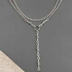 🟪QUALITY materials, HANDMADE in California 🟪This gorgeous necklace set adds the perfect EDGY-CASUAL finishing touch! 🟢CHAIN:  -stainless steel (NON-TARNISH, long-lasting) ✅two separate necklaces -14 inch and 16 inch, OR -16 inch and 18 inch (women's average neck size), OR -18 inch and 20 inch, OR -20 inch and 22 inch  -see Sizing Chart photo -lobster claw clasp 🟢PENDANT:  -antiqued silver plated base metal -tarnish resistant coating 🟦CARE INSTRUCTIONS: To maintain the color and shine of our fashion jewelry: avoid contact with beauty/body products and water/perspiration; clean with a jewelry polishing cloth; and use airtight storage (0924)(5mmcurb)(MCact7/PR29/PC47,5SP) Necklaces Layered, Metal Pendants, Airtight Storage, Barbed Wire, Goth Grunge, Punk Goth, Beauty Body, Metal Pendant, Body Products