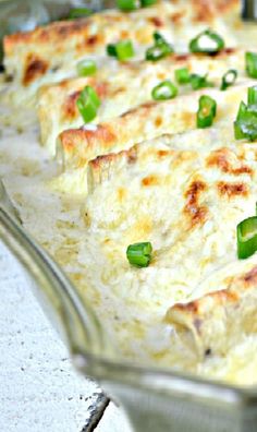 a casserole dish with green peppers and cheese on it, ready to be eaten