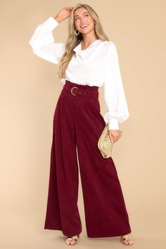 When you have to choose between "those" drab dress pants and these polished burgundy wide leg pants - I know you will choose the latter! You are always Keeping It Classy, in the office and beyond! These pants feature a paper bag style waistline, an adjustable belt, a zipper closure, and very flowy legs. Model is wearing an x-small. • 97% Polyester, 3% Spandex • Hand Wash Cold • Unlined • Imported Burgundy Wide Leg Pants, Burgundy Corduroy Pants, White Satin Top, Classic Blouses, Red Dress Boutique, Keep It Classy, Bow Back, Cowl Neckline, Satin Top