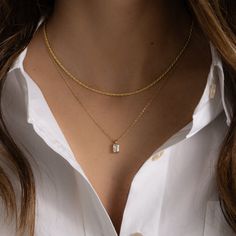 This timeless necklace is the perfect addition to elevate any look. Featuring a beautiful emerald cut diamond, this necklace will add the perfect amount of elegance to any outfit. Can be worn alone or paired with other pieces for a gorgeous stacked look! Made of 925 Sterling Silver THICK plating of 14k Gold or Rhodium Chain Length - 16” or 18" + 3” Extension Made of HIGHEST QUALITY Cubic Zirconia VERY HIGH QUALITY Nickel-free & Hypoallergenic - will not irritate skin! Lobster Clasp Closure Minimalist Necklace Stack, Emerald Cut Diamond Necklace, Gold Asthetics, Emerald Cut Necklace, Baguette Pendant, Dainty Necklace Gold, Timeless Necklace, Dainty Jewellery, Classy Necklace