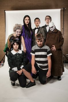 a group of people dressed up in halloween costumes