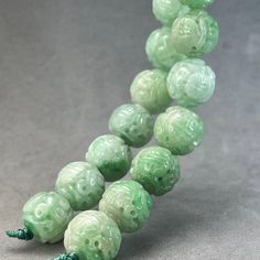 Style: One apple green Hand carved jadeite bead, natural color jade bead of dragon and longevity symbolMaterial: Natural Jadeite, jadeite, vintage, Burmese jadeMethod: hand carved and polished, very detailsType: bead, collectible, art object, charm, one of a kindSize: 10mm Luxury Green Carved Jewelry, Luxury Traditional Jade Jewelry, Luxury Carved Traditional Beads, Luxury Carved Jade Jewelry, Luxury Polished Jade Jewelry, Unique Luxury Jade Jewelry, Luxury Carved Beads As A Gift, Luxury Traditional Carved Beads, Jade Properties