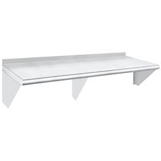 a white shelf sitting on top of a wall