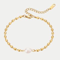 This stunning Aurora golden pearl beaded bracelet radiates elegance with its gorgeous golden sheen and luxe pearl. Divinely designed to be waterproof and tarnish proof, it's a must-have accessory for any wardrobe! Perfect for making a statement, this gold-plated masterpiece is sure to turn heads. ………………………………….D E T A I L S• Materials: Stainless steel, 18k gold plating, freshwater pearl.• Length: 17cm (6.7 inches) + extender 5cm (2 inches)• Width: 0.3cm (0.1 inch)• This product is hypoallergenic Classic Gold Pearl Beaded Bracelets, Classic Gold Bracelets With Pearl Charm, Elegant Metal Beaded Bracelet With Gold Beads, Elegant Metal Beaded Bracelets With Gold Beads, Classic Gold Bracelet With Pearl Drop, Gold Pearl Bracelet With Pearl Charm For Formal Occasions, Gold Pearl Oyster Bracelet For Formal Occasions, Elegant Beaded Metal Bracelets With Pearl Charm, Classic Gold Pearl Drop Bracelet