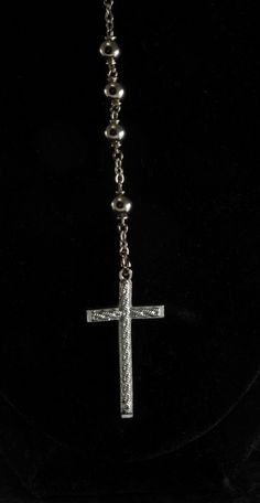 "For sale is a vintage rosary beaded cross necklace. This necklace is silver tone metal with silver tone metal beads. The cross measures 3/4 x 1 1/2\". The rosary chain measures 24\" with a 3 1/2\" drop. New Treasures added all the time. Check back often!" Silver Cross-shaped Jewelry With Beaded Chain, Silver Cross Jewelry With Beaded Chain, Silver Cross Rosary Bracelet, Nickel-free Silver Cross Rosary Bracelet, Vintage Silver Rosary With Round Beads, Silver Beaded Crucifix Jewelry, Silver Beaded Chain Rosary, Silver Beaded Cross Jewelry, Silver Cross Rosary Spiritual