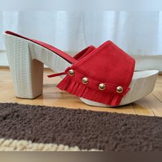 Unworn Wood And Suede Heeled Sandals/Mules/Clogs. Red Suede With Gold Rivets And Fringe Details. Red High Heel Platform Mules, Casual Slip-on Clogs For Party, Casual Slip-on Party Clogs, Casual Party Slip-on Clogs, Red Platform Slip-on Sandals, Casual Round Toe Clogs For Party, Red Clogs For Beachwear In Summer, Red Summer Beach Clogs, Casual Platform Clogs For Party