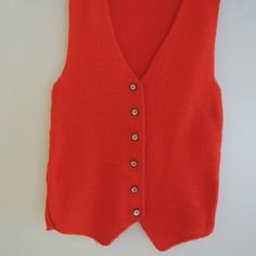 Ladies Vest Size S Lightweight Red Ribbed Cotton Lycra Stretch Sleeveless Top Nwot. Ladies Red Ribbed Vest/Sleeveless Top Can Be Worn Plain Or Over A Shirt, Tee Shirt, Cami, Etc. Features A 6 Button Front, V-Shaped Bottom In Front, Straight Cut In Back; Reinforced Button Placket Sewn On Inside. Size S, Cotton/Lycra Spandex Blend Fabric With Lots Of Stretch To It So It Can Easily Fit A Ladies Size 6 Through 12, Depending On How Snug You Wear Your Clothes. Was A Gift So The Tags Were Cut Off Becau Orange Sleeveless Winter Vest, Winter Orange Sleeveless Vest, Orange Ribbed Sleeveless Top, Red Sleeveless Winter Vest, Fitted Red Sleeveless Sweater Vest, Red Fitted Sleeveless Sweater Vest, Red Fitted Sweater Vest, Fitted Red Sweater Vest For Spring, Red Sleeveless Sweater Vest For Summer