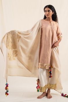 Moonga ivory silk brocade dupatta with floral motif and multi color tassels. - Aza Fashions Designer Cotton Silk Cream Dupatta, Designer Cream Cotton Silk Dupatta, Designer Wear Dupatta With Tassels For Diwali, Festive Chanderi Kurta With Tassels, Wedding Beige Dupatta In Slub Silk, Wedding Beige Slub Silk Dupatta, Transitional Cream Cotton Silk Dupatta, Designer Anarkali Dupatta With Tassels, Designer Dupatta With Tassels For Festivals