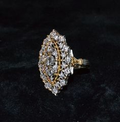 Buccellati original 1910 Diamond about 3.5 ct Gold 14 and 18 ct Total weight 9gm The ring was done by Mario Buccellati him self Very rare thing in Market Luxury Pear-shaped Diamond Ring With 17 Jewels, Luxury Pear-shaped Diamond Ring With Single Cut Diamonds, Luxury Formal Cluster Diamond Ring, White Marquise Diamond Ring With 17 Jewels, Formal Silver Cluster Ring With 17 Jewels, Luxury Diamond White Cluster Ring For Formal Occasions, Luxury Pear-shaped Brilliant Cut Cluster Ring, Elegant Collectible Jewelry With Single Cut Diamonds, Ceremonial Oval Diamond Rings