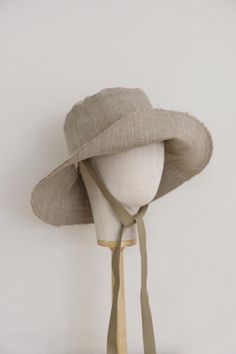 Handcrafted in Adelaide, South Australia. This cotton wide brim hat offers exceptional breathability and comfort, making it a perfect choice for sunny days. Crafted with love and care, this versatile hat is designed to not only enhance your look but also provide essential sun protection. Please allow 1-2 weeks turnaround time for all made to order items. * Linen * Cotton Lining * Raw edged Size guide: Adult S fits head circumference 55 -57cm Adult M fits head circumference 57 -59cm Adult L fits Adjustable Fit Hats For Summer Outdoor, Adjustable Fit Hat For Summer Outdoor Activities, Lightweight Adjustable Brimmed Sun Hat, Adjustable Lightweight Brimmed Sun Hat, Natural Bucket Hat For Spring Outdoor, Spring Natural Color Bucket Hat For Outdoor, Adjustable Fit Beige Sun Hat For Travel, Natural Bucket Hat For Outdoor Summer Activities, Adjustable Beige Sun Hat For Travel