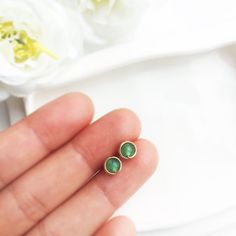 💚 Genuine Green Jade Stud Earrings with choices of 14K Gold filled, Rose Gold Filled and Sterling Silver•Jade Size: 4mm✨ Jade is believed to bring good luck. This bright green gemstone is thought to bring protective, lucky-charm energy to the wearer ✨• 14K gold-filled and Sterling Silver is known for its lasting quality. These earrings will last for decades and are considered lifetime pieces of jewelry.• These earrings won’t tarnish. You can wear them every day or even in a shower. You never ha Hypoallergenic 14k Gold Green Jewelry, Hypoallergenic Green 14k Gold Jewelry, Nickel Free Yellow Gold Jewelry For May Birthstone, Nickel-free Yellow Gold Jewelry For May Birthstone, Nickel-free Yellow Gold May Birthstone Jewelry, Everyday Green 14k Gold Earrings, Dainty May Birthstone Earrings, Dainty Earrings For Jewelry Making With May Birthstone, Dainty Emerald Earrings As A Gift