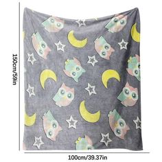 a blanket with owls and stars on it, next to the measurements for each pillow