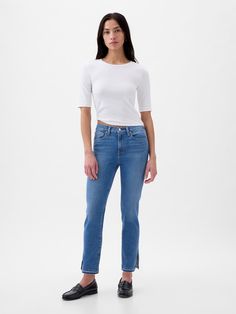 Fit: A slim, ankle-length classic.  More room than our True Skinny, but just as comfortable.  Fabric: 87% Cotton, 7% Recycled Materials, 5% Polyester.  Stretch: Stretch Jeans.  A bit of hug & a lot of hold.  Comfortable & designed to flatter.  Rise: Mid Rise Jeans.  Look: A classic five-pocket jean in medium indigo wash.  Details: Zip fly, five-pocket styling & holds-you-in front pockets.  Certain styles have raw hem or split at hem.  Responsibly Made: This pair of jeans is part of our water-sav Fitted Gap Jeans For Everyday Wear, Fitted Gap Jeans For Everyday, Everyday Fitted Jeans By Gap, Gap High Rise Fitted Jeans, Gap Fitted High Rise Jeans, Gap High-rise Fitted Jeans, Gap Fitted High-rise Jeans, Gap Fitted Jeans For Fall, Slim Fit Gap Jeans For Fall