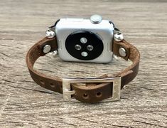 Apple Watch Band 38mm 40mm 42mm 44mm Leather Strap. 10mm Genuine Vintage Leather Strap with Adjustable Buckle. This Bracelet Fits ALL Apple Watch Series. Designed And Handmade by Simeon D Jewelry Studio. Create Your Own Unique Style! Be Different! Be Unique! Adjustable Size Bracelet Perfectly Tailored to Fit Your Wrist. Not For Other Models. Apple Watch Is NOT Included Follow my Studio on Social Media for Updates & New Designs Adjustable Silver Watch Bands With Palladium Hardware, Vintage Adjustable Apple Watch Band Rectangular, Vintage Adjustable Apple Watch Band, Adjustable Silver Leather Watch Accessories, Silver Leather Strap Apple Watch Band For Everyday, Silver Apple Watch Band With Adjustable Leather Strap, Silver Adjustable Watch Bands For Everyday Use, Adjustable Silver Apple Watch Band For Everyday Use, Adjustable Silver Apple Watch Band