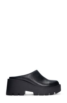 A chunky platform and lug sole modernize this clog outfitted with a padded footbed. 2 3/4" heel; 1 1/4" platform Synthetic upper, lining and sole Imported Modern Black Platform Slippers With Textured Sole, Modern Synthetic Clogs With Textured Sole, Casual Workwear Clogs With Textured Sole, Modern Clogs With Cushioned Footbed For Work, Modern Slip-on Clogs With Textured Sole, Platform Clogs With Synthetic Material For Work, Workwear Platform Clogs With Synthetic Material, Black Chunky Platform Mules In Modern Style, Workwear Synthetic Platform Clogs