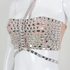 Made with a stunning diamond neck chain, this halter top adds a touch of glamour to any outfit. Its eye-catching design will surely turn heads and make a statement. - Color: Black, Beige- Style: Halter Top- Sleeve Length: Sleeveless- Neckline: Halter Neck- Fabric: Polyester- Details: Rhinestones- Fit Type: Slim Fit- Occasion: Casual, Party- Gender: Women- Size: S, M, L (Unit: cm) Size Chest Waist Hip Glamorous Embellished Halter Top For Summer, Glamorous Embellished Summer Halter Top, Embellished Halter Top For Party, Elegant Embellished Halter Top For Parties, Glamorous Sequin Halter Top For Evening, Glamorous Embellished Halter Top For Evening, Chic Embellished Halter Top For Parties, Chic Embellished Halter Top For Evening, Elegant Silver Crop Top For Evening