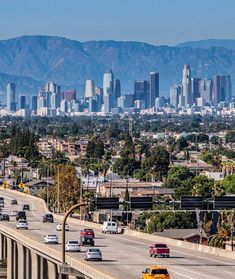 cars are driving on the freeway in los angeles