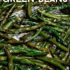 cooked green beans on a baking sheet with the title overlay that reads how to cook green beans