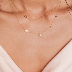 The original Asymmetrical Letter Necklace has been a brand favorite since its launch in 2008. It has been spotted on Meghan Markle, Mila Kunis (among others) and now you! Choose from letters, charms and birthstones to build a necklace that is uniquely yours. As you build check back to the product photo to see a preview of your design. As these are made to order they are final sale. This custom necklace will ship in approximately 1-2 weeks Details • Made to order in Los Angeles • Each necklace is Dainty Personalized Charm Necklace With Letter, Maya Brenner Initial Necklace, Custom Gold Necklace, Personalized Gold Letter Print Necklace, Birthday Letter-shaped Name Charm Necklaces, Maya Design, Gold-tone Metal Chain Necklace With Logo Charm, Mandy Moore, Mila Kunis