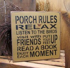 a sign that reads porch rules relax listen to the birds visit with put up friends and feed read a book enjoy each moment